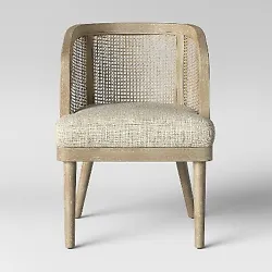 Bringing slight nostalgia and antique elegance to any room, this Juniper Cane and White-Washed Wood Barrel Chair from...