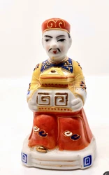 It is brightly painted with moriage details. This would have been produced in Japan in the 1949s. There is no makers...