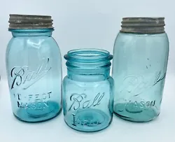 3 Antique Canning Jars. 2 Perfect Mason Ball Jars with lids. Turquoise in color.