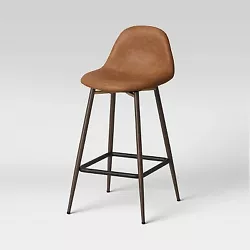 •Wooden counter-height barstool lends a stylish update to your indoor space. •Upholstered with faux-leather fabric...