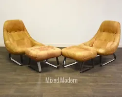 A pair of mid century modern suede leather “Earth” lounge chairs and matching ottomans by Brazilian designer...