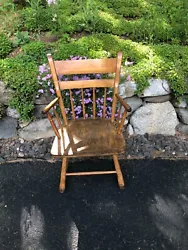 Beautifully crafted antique plank Windsor chair with arms. Very sturdy. The original old finish has been removed and...