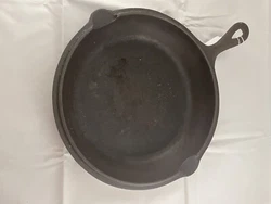 Item is an unmarked cast iron double skillet probably made by Birmingham Stove. It measures 10 & 1/4 inches edge to...