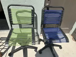 The Container Store Bungee Office Desk Chair. set includes both chairs, blue and green. Both work the hydraulics go up...