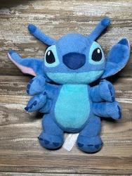 Disney parks 4 arms stitch doll plus hula stitch doll. Please note these dolls are in preowned condition, however...