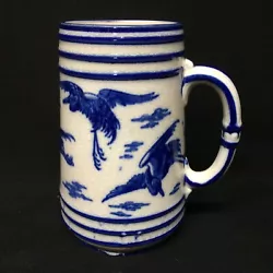 Dresser clearly looked to Japanese sources for inspiration and artistic guidance. BLUE TRANSFERWARE TANKARD. This...