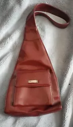 MAROON Guess Leather Sling Bag Backpack Women Crossbody Shoulder GREAT SHAPE. This womens pocketbook sling bag is in...