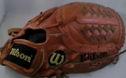 Wilson Leather Right Hand Baseball Glove. Condition is 
