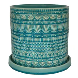 Cylinder shape is ideal to drop in a new houseplant. Enhance your space with this Seven Seas Ceramic Planter. Ceramic...