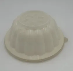 This vintage Tupperware jello mold insert features a unique 5 pointed star shape, perfect for impressing your guests at...