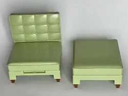 Green lounge chair and ottoman. in good condition