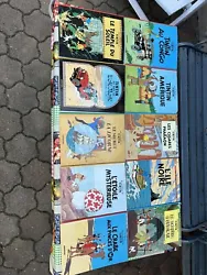 Lot 21 Livres Tintin Dans Leurs Jus. Voir photos avant d’acheter Certains livres gondoles Certains bords abîmés...