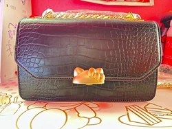 Delicate hello Kitty cat head lock and classic crocodile pattern. Can be used as a shoulder bag or crossbody bag. Youll...