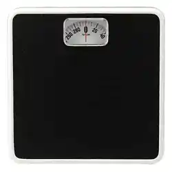 The scale features a red pointer line that indicates weight. Taylor 9.8” x 9.8” Analog Bathroom Scale with Dial...