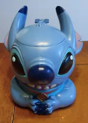 Early 2000s Disney On Ice Souvenir Stitch Mug with hinged lid. Holds about 12 oz. Good condition, some minor wear,...