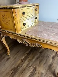 It has 2 drawers, there are stains inside the drawers from the previous owners, but they are surface and could be...