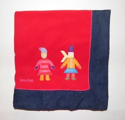 Red fleece with a jean like blue around the edges. About 30