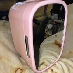 Personal makeup refrigerator. Small mark on side, minor scratches on other side. Works great