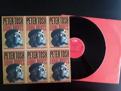 Peter Tosh ‎– Equal Rights. NM = Near Mint : La pochette est presque parfaite. Le disque est presque parfait....