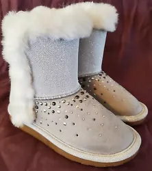 Soft faux fur on the top and inside. Your little girl will love her sparkle boots! Features include micro suede...