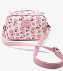 This Loungefly Hello Kitty Strawberry Milk Crossbody Bag Purse is the perfect accessory for any fan of the adorable...