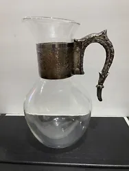Vintage Glass Silverplate Collar Metal Handle Cold/ Hot Pitcher Carafe 48oz. Condition is Used. Shipped with USPS...