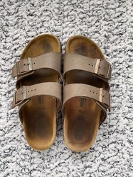 Birkenstock size 34 brown shoes.