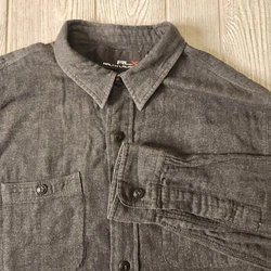This stylish gray RLX Ralph Lauren button-up shirt is a classic addition to any wardrobe. Made of cotton material, it...