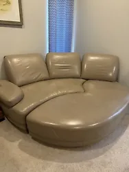 Leather Sofa-transformer. Condition is Used. Local pickup only.