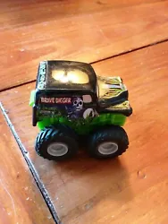 Hot wheels Miniature Micro Monster Truck Grave Digger Mini - 2003. [UBB3] Still pulls back and rolls when released, ...