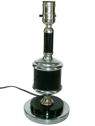 A vintage art deco style chrome steel table lamp, has a new power cord, it stands 12