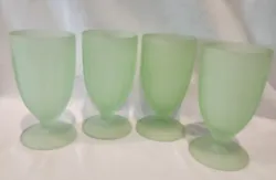 Add a touch of vintage American charm to your drinkware collection with this set of four green satin frosted goblets....