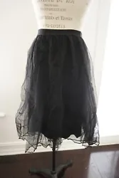 Joh Apparel Skirt. Black tulle with a skirt underneath. You can dress this skirt up or even dress down with a cropped...
