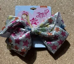 Brand new with tags Jojo bow. Pattern is multi colored stars. Comes from a smoke and pet free home.