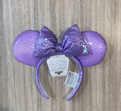 Hi up for sale is a New Disney Parks pair of Minnie Mouse ears headband and the color is Purple with allover sequins...