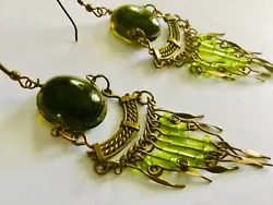 Up for sale, I have antique Western chandelier earrings. These are so amazingly beautiful green color cabachons with...