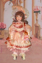 Doll has a porcelain bust, porcelain arms just below elbow, and porcelain legs just below the knee.Wonderful...
