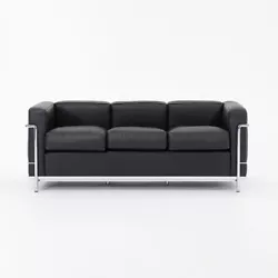 This is an LC2 petit modele 3-seater sofa, designed by Le Corbusier, Pierre Jeanneret, and Charlotte Perriand. This...