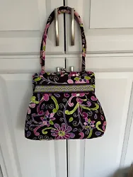 This is vera Bradley, purple punch, kissing, clutch closure, excellent condition, like new no signs of wear at all...