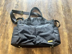 SKIP HOP Duo Signature Messenger Diaper Bag Solid Black With Changing Pad. At some point a bottle leaked a small amount...
