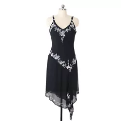 Sparkling beaded and sequin trim flowers. shown on size 8 dress form. black poly chiffon - fully lined.