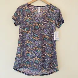 Size XXS, Fits 00-0. Slightly longer in the back, pairs well with leggings/skirts.