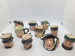 Lot of 10 small size Royal Doulton jug mugs. One of them has a chip in the inside one of the hats.