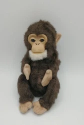 Meet your new Furreal Friends BABY MONKEY Chimp! This interactive pet from Hasbro was released in 2009 and is ready to...