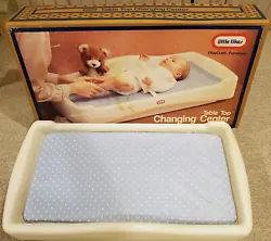 Little Tikes Table Baby Top Changing Center. Removable, thickly-cushioned pad covered in wipe-clean vinyl....