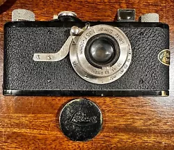 This is a classic and functional Leica I (Model A) film camera in black and nickel finish. Extremely rare and...
