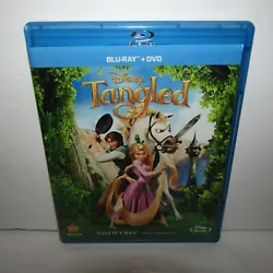 Disneys Tangled. The blu-ray disc looks good with minimal to no scratches. The DVD has a few light scratches. The case...