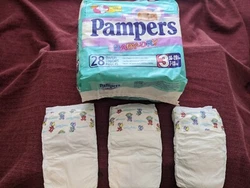 These Pampers Baby Dry plastic diapers feature a plastic outer covering, GentleTouch Liner plus aloe to help keep skin...