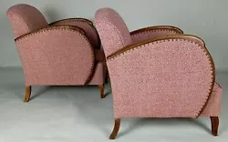 Comfortable pair of Club-shaped Art Deco armchairs with large wing armrests, upholstered with a beautiful pink tweed...