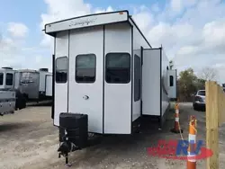 Forest River Sandpiper Destination Trailer 401FLX highlights: Tri-Fold Hide-A-Bed Sofa Shower with a Seat King Bed...